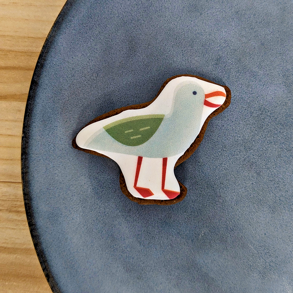 Gâteau artisanal mouette – souvenir comestible au style doux et marin
