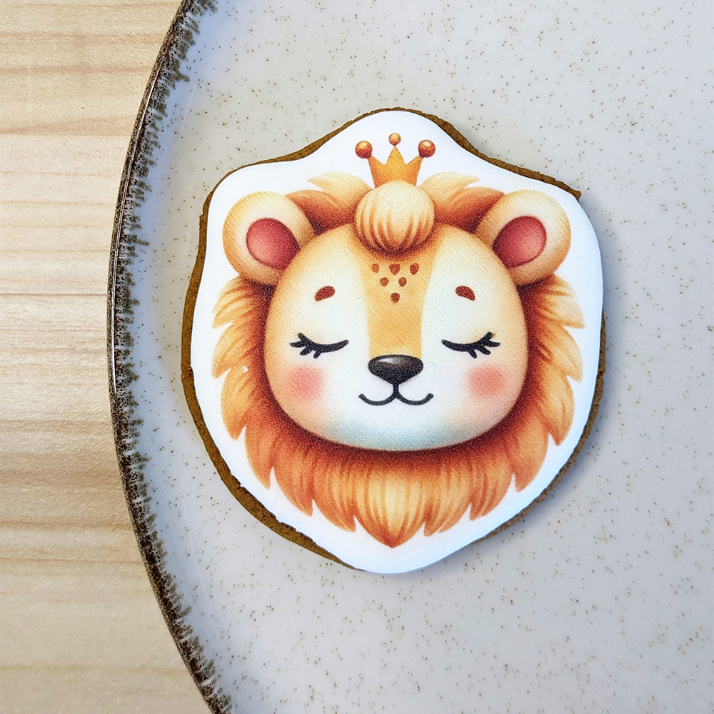 Biscuit décoré en forme de lion pour anniversaire d’enfant, thème animaux sauvages